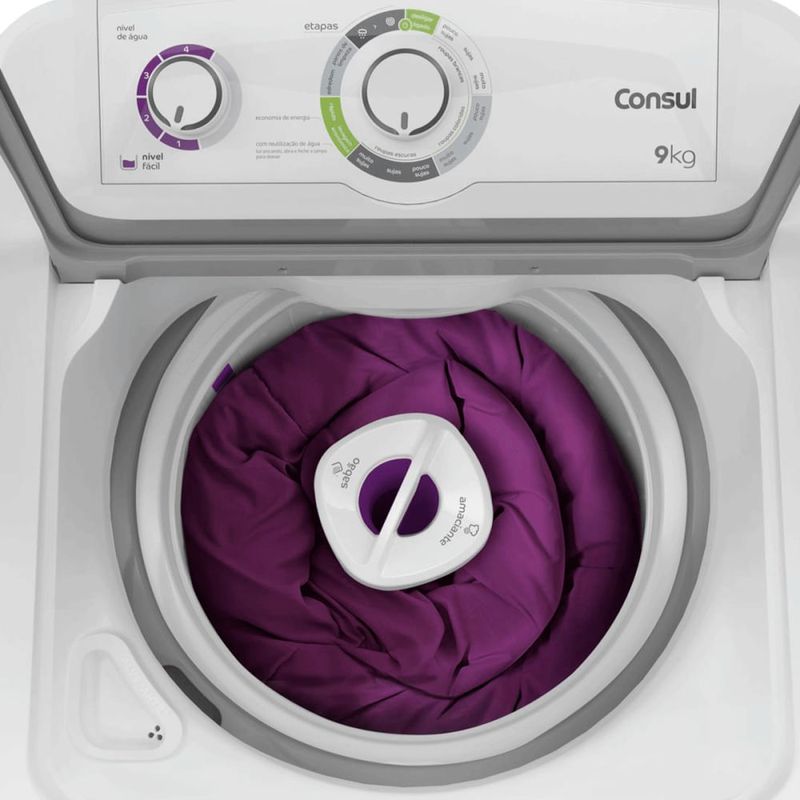 Imagem-superior-da-maquina-de-lavar-com-a-tampa-aberta.-Em-seu-interior-ha-um-edredom-roxo.